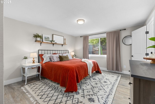 6696 Doral Dr SE, Salem, OR 97306 - bedroom featuring baseboards and light wood-style floors