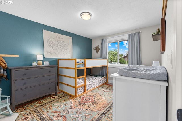6696 Doral Dr SE, Salem, OR 97306 - bedroom with a textured ceiling