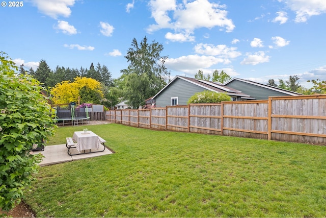 6696 Doral Dr SE, Salem, OR 97306 - view of yard with a trampoline and a patio area