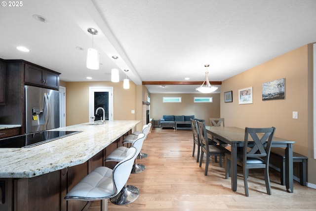 1412 SW Chastain Ave, Gresham, OR 97080 - dining space with light wood finished floors and recessed lighting