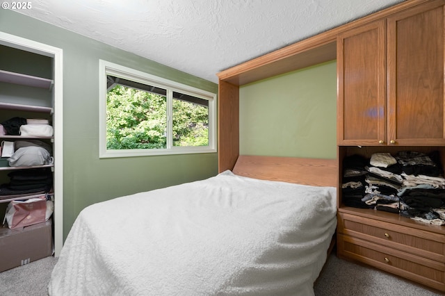 1412 SW Chastain Ave, Gresham, OR 97080 - bedroom featuring carpet flooring and a textured ceiling