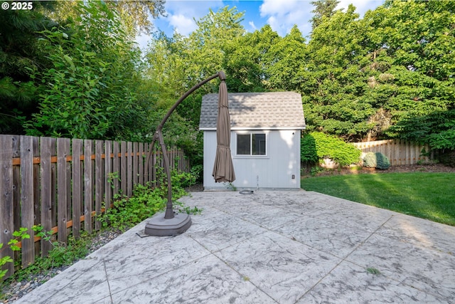 1412 SW Chastain Ave, Gresham, OR 97080 - fenced backyard featuring a patio area and a storage unit
