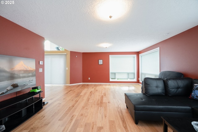1412 SW Chastain Ave, Gresham, OR 97080 - sitting room with light wood-type flooring and a textured ceiling