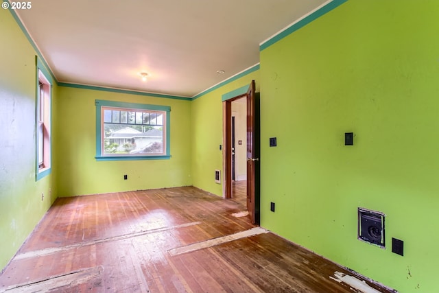 6861 N Sky St, Portland, OR 97203 - spare room with wood-type flooring and ornamental molding