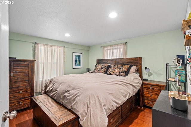 bedroom with hardwood / wood-style floors