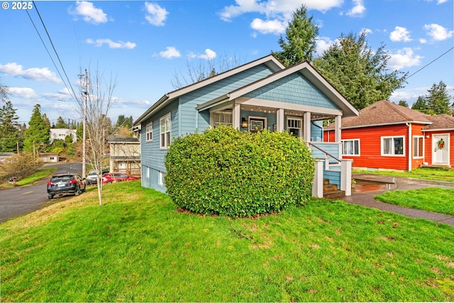 view of front of home with a front yard