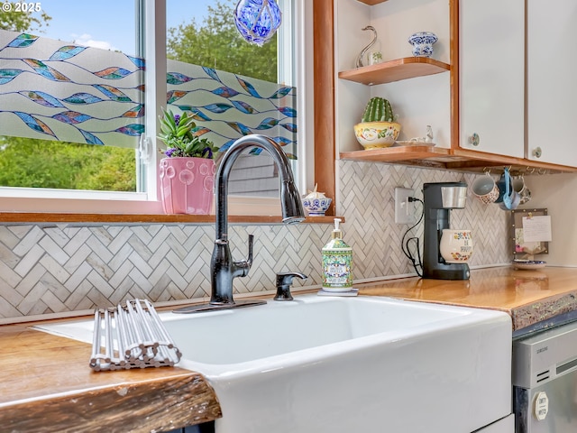 91196 Youngs River Rd, Astoria, OR 97103 - kitchen with open shelves, decorative backsplash, and light countertops