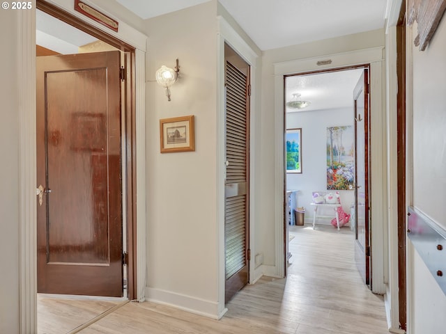 91196 Youngs River Rd, Astoria, OR 97103 - corridor with light wood finished floors and baseboards