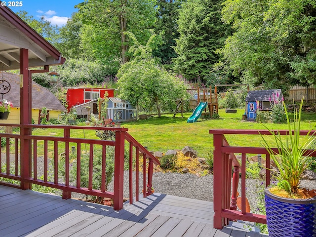 91196 Youngs River Rd, Astoria, OR 97103 - deck with a storage shed, a fenced backyard, and a playground