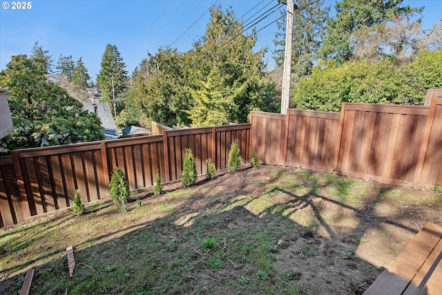 view of yard featuring a fenced backyard