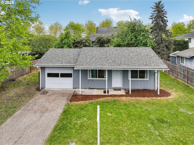 ranch-style house featuring driveway, fence, a garage, roof with shingles, and a front lawn
