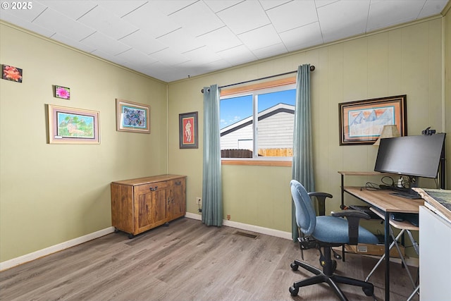 office area with light hardwood / wood-style flooring