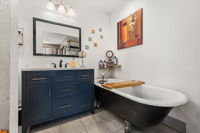 bathroom featuring a bath and vanity