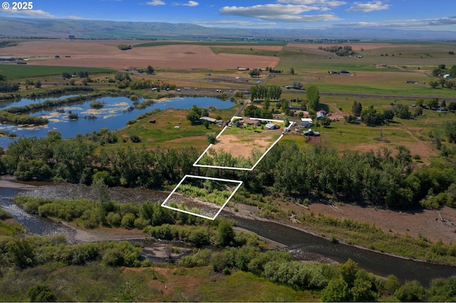 73594 Davis Ln, Pendleton, OR 97801 - aerial view of sparsely populated area featuring property parcel outlined and a nearby body of water