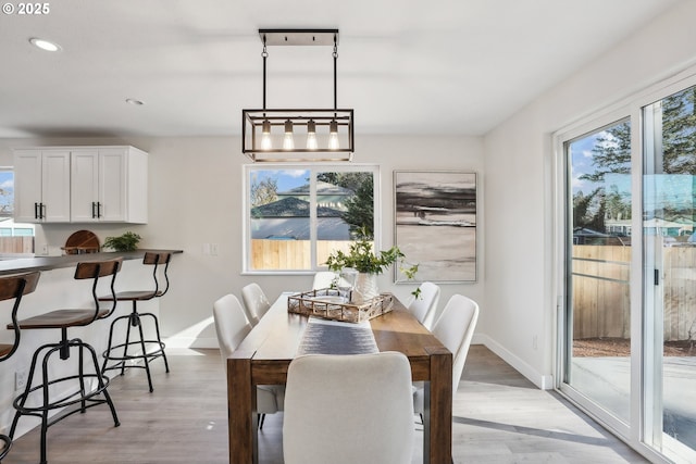 dining room featuring light wood-type flooring