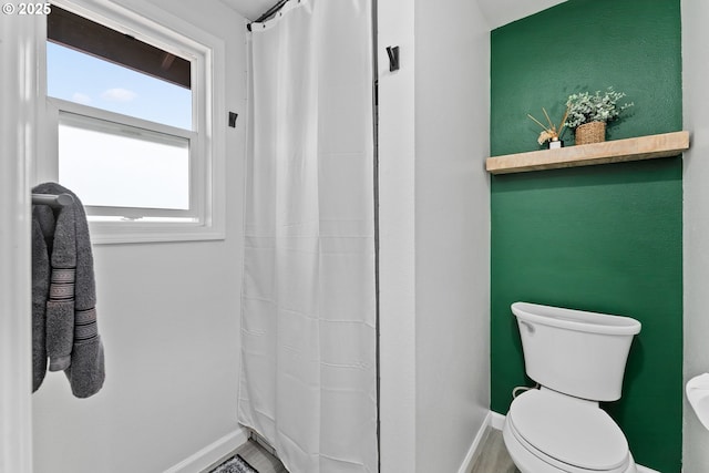 222 NE Darcie Way, Myrtle Creek, OR 97457 - full bathroom with baseboards, toilet, and a shower with shower curtain