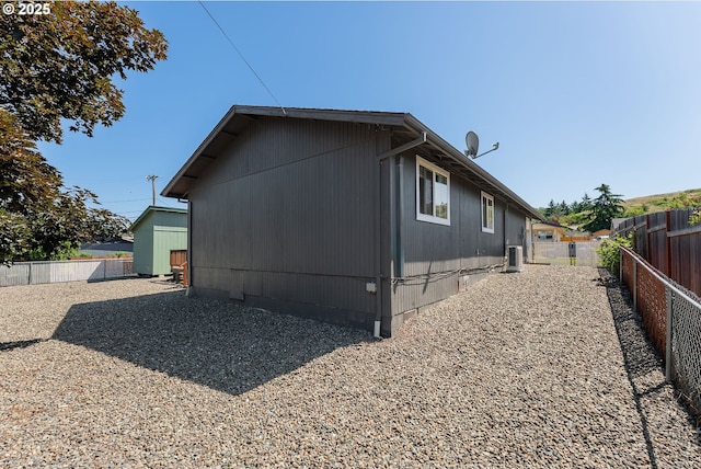 222 NE Darcie Way, Myrtle Creek, OR 97457 - view of property exterior featuring a fenced backyard and cooling unit