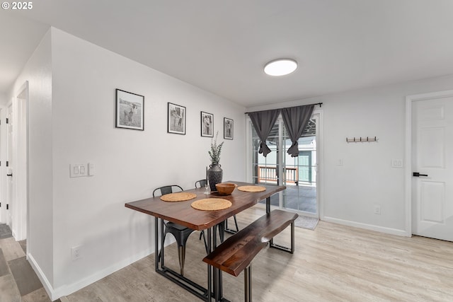 222 NE Darcie Way, Myrtle Creek, OR 97457 - dining space with light wood-style flooring and baseboards