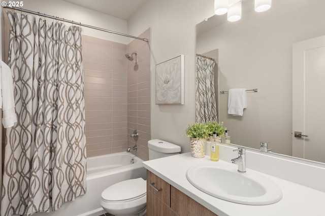 full bathroom featuring vanity, toilet, and shower / tub combo