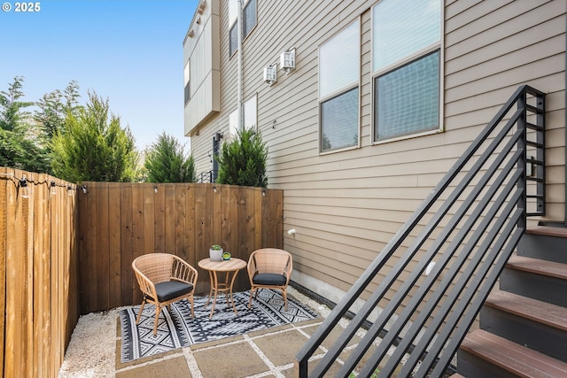 view of patio with fence