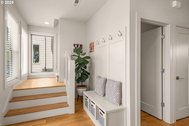 mudroom with recessed lighting, visible vents, and light wood-style floors