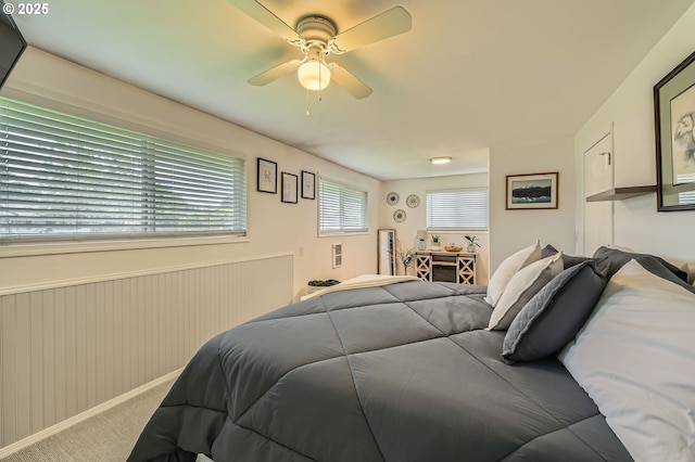 8413 NE Lewis Dr, Vancouver, WA 98662 - carpeted bedroom featuring ceiling fan and a wainscoted wall