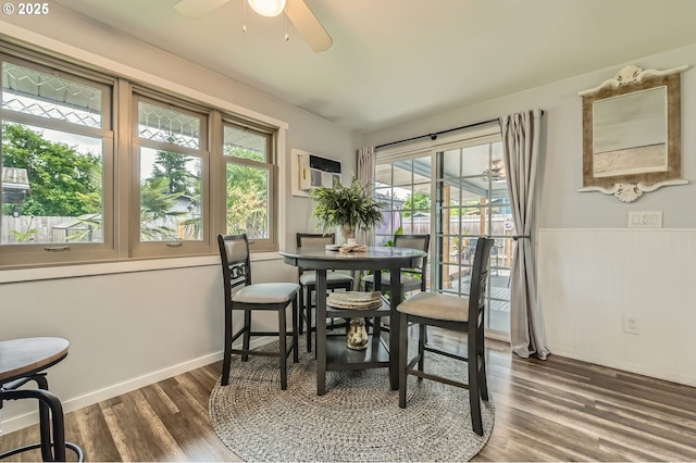 8413 NE Lewis Dr, Vancouver, WA 98662 - dining room with ceiling fan, wood finished floors, baseboards, and an AC wall unit