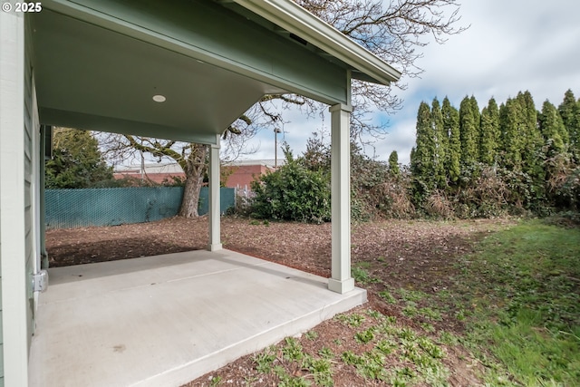 exterior space with a patio area and fence