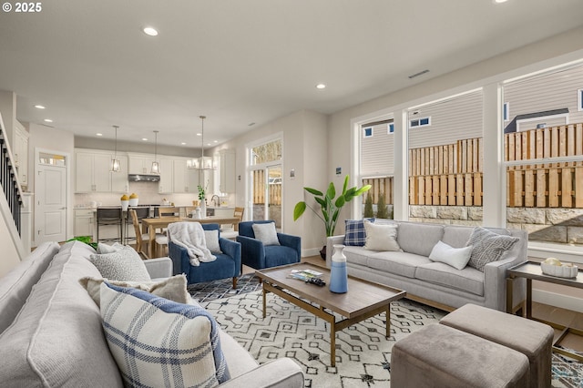 4420 NW 178th Ter Lot 27, Portland, OR 97229 - living area with recessed lighting, stairs, and a chandelier