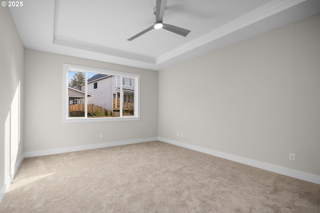 4420 NW 178th Ter Lot 27, Portland, OR 97229 - carpeted spare room featuring a tray ceiling, crown molding, ceiling fan, and baseboards
