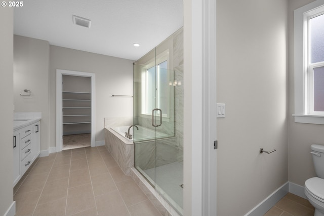 4420 NW 178th Ter Lot 27, Portland, OR 97229 - bathroom with toilet, plenty of natural light, a garden tub, a stall shower, and recessed lighting