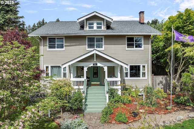 636 S Nehalem St, Clatskanie, OR 97016 - traditional style home with a chimney, covered porch, roof with shingles, and stairs