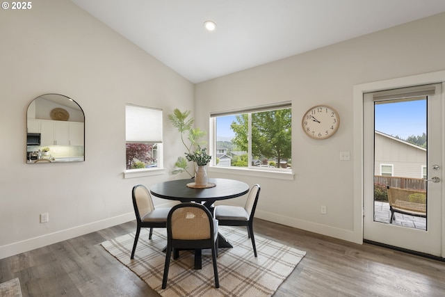 367 E 4th St, Lowell, OR 97452 - dining space with healthy amount of natural light, baseboards, wood finished floors, recessed lighting, and high vaulted ceiling