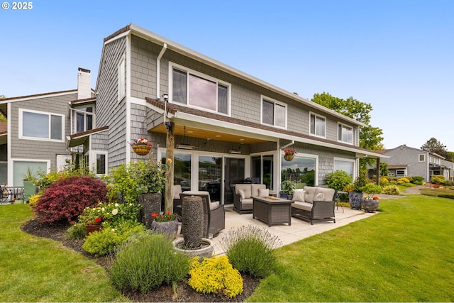 620 N Hayden Bay Dr, Portland, OR 97217 - back of house featuring an outdoor living space, a patio, a lawn, and a chimney