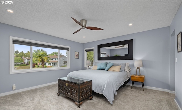 620 N Hayden Bay Dr, Portland, OR 97217 - carpeted bedroom featuring recessed lighting, baseboards, a textured ceiling, and a ceiling fan