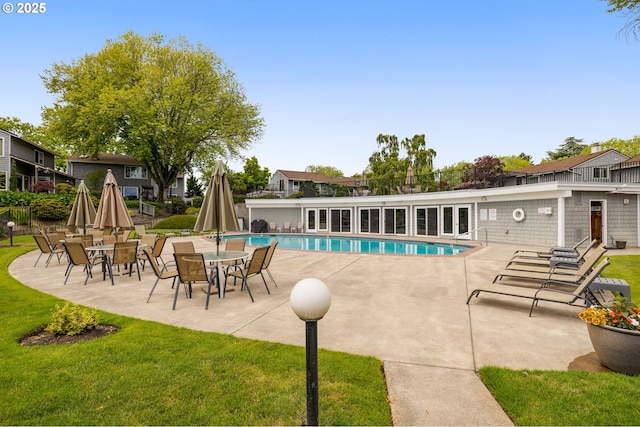 620 N Hayden Bay Dr, Portland, OR 97217 - community pool featuring a patio area and a yard
