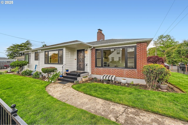 1805 NE Saratoga St, Portland, OR 97211 - bungalow-style house with a chimney and brick siding