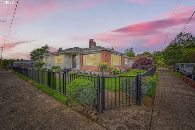1805 NE Saratoga St, Portland, OR 97211 - bungalow-style house with brick siding and a chimney