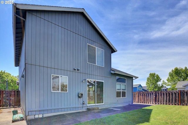 back of house with a patio area
