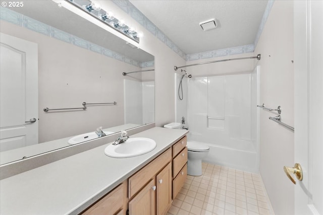 16605 SW Sumac St, Beaverton, OR 97007 - full bathroom with vanity, toilet, shower / washtub combination, and a textured ceiling