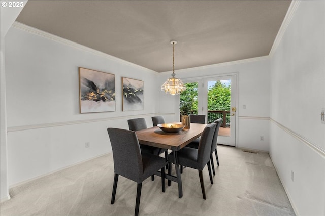 16605 SW Sumac St, Beaverton, OR 97007 - dining area with light carpet, crown molding, a chandelier, and baseboards