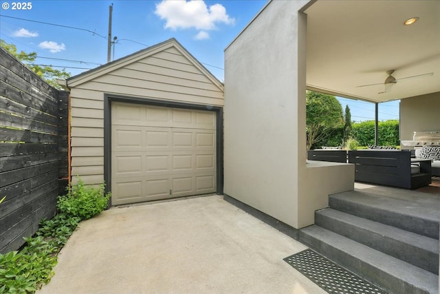 7338 N Chase Ave, Portland, OR 97217 - detached garage with a ceiling fan and concrete driveway