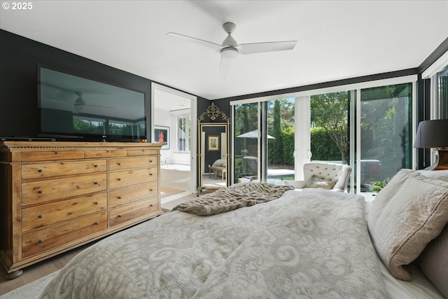 7338 N Chase Ave, Portland, OR 97217 - bedroom featuring access to exterior, wood finished floors, and a ceiling fan