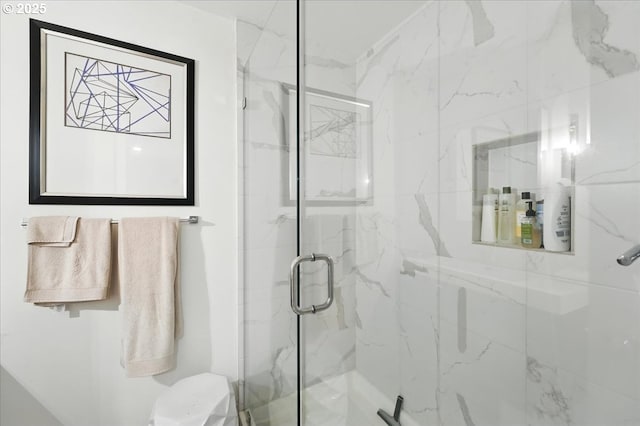 7338 N Chase Ave, Portland, OR 97217 - bathroom featuring toilet and a marble finish shower
