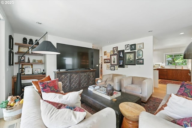 7338 N Chase Ave, Portland, OR 97217 - living area featuring light wood finished floors and recessed lighting