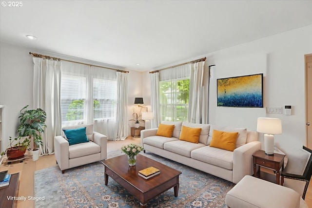 7338 N Chase Ave, Portland, OR 97217 - living room featuring wood finished floors and recessed lighting
