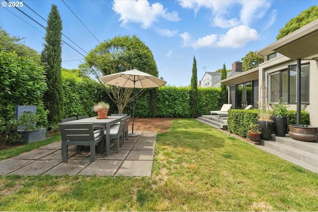 7338 N Chase Ave, Portland, OR 97217 - view of grassy yard with a patio and outdoor dining area