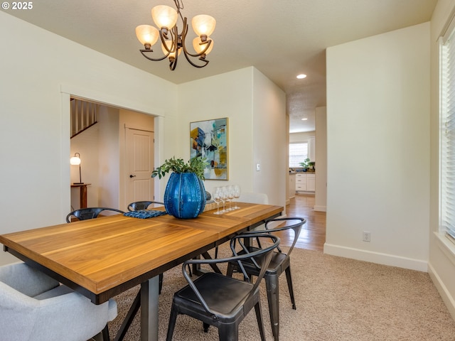 7760 SW Hyland Way, Beaverton, OR 97008 - dining area featuring a chandelier, recessed lighting, baseboards, and light carpet