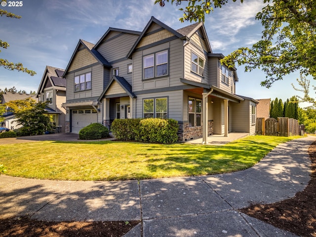 7760 SW Hyland Way, Beaverton, OR 97008 - craftsman-style home featuring an attached garage, stone siding, and asphalt driveway