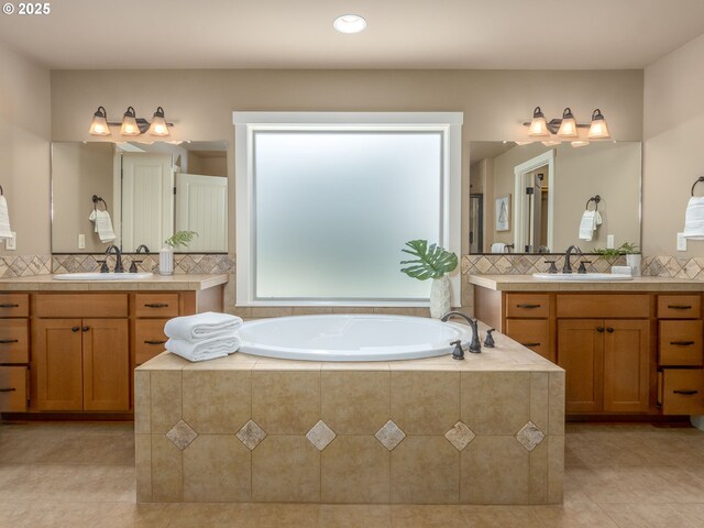 7760 SW Hyland Way, Beaverton, OR 97008 - bathroom with tile patterned floors, a bath, decorative backsplash, and recessed lighting